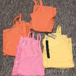 4 Girl’s tanks with Ruffle / Button Detailing